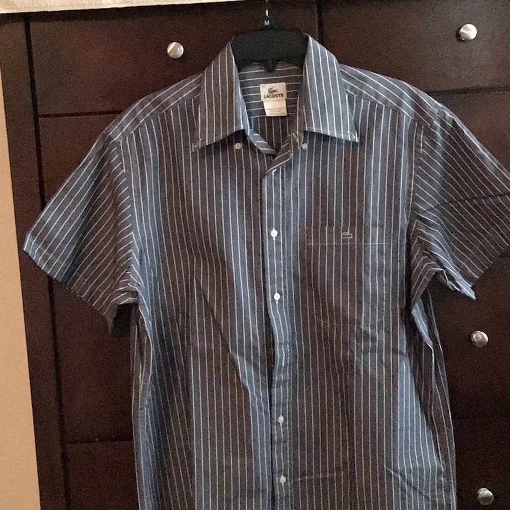 Lacoste short sleeves polo shirt in gray. Size 42.with front pocket